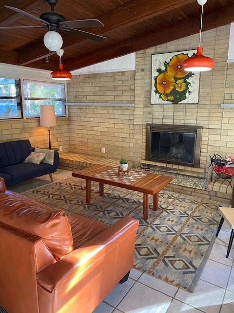 Living room with Ocala block walls, vaulted wood ceilings - 3812 SW 15th St
