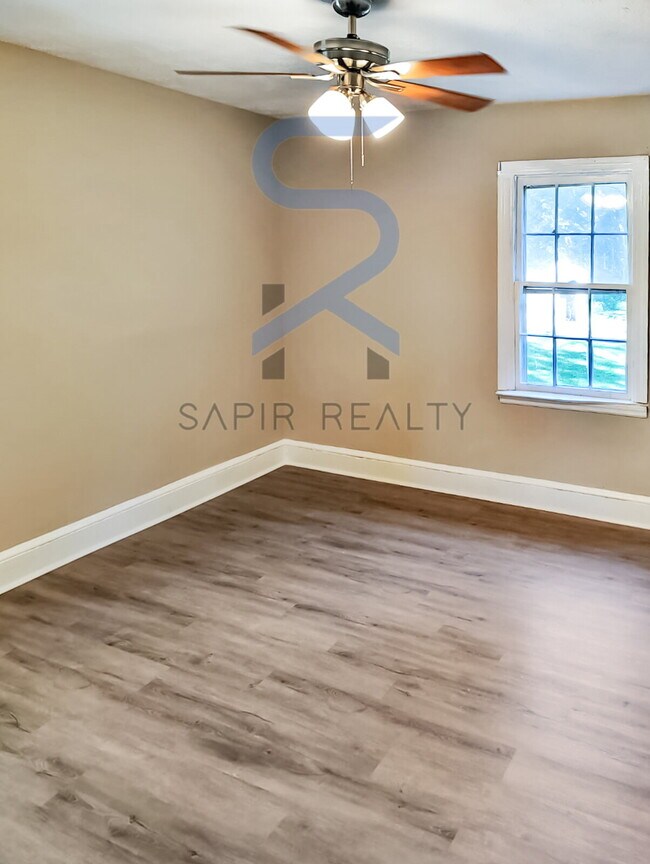 Building Photo - Move in before December 31st and choose your reward: a $250 Amazon Gift Card or a 55" Smart TV!