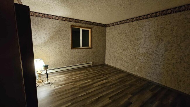 Building Photo - Beautiful House with 2 Wood Stoves across from park in Kalispell