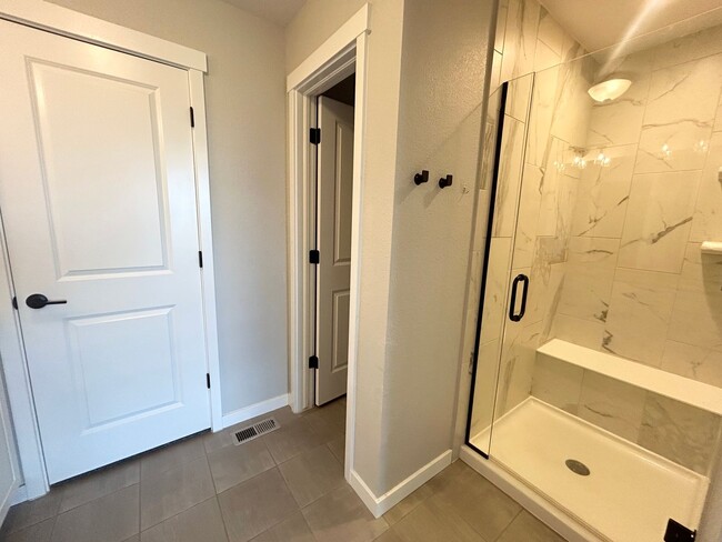 Building Photo - Impressive 4 Bedroom Townhome Nestled in M...