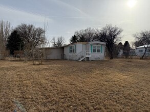 Building Photo - 2 Bedroom 1.5 Semi-Rural Mobile Home with Workshop on Large Lot