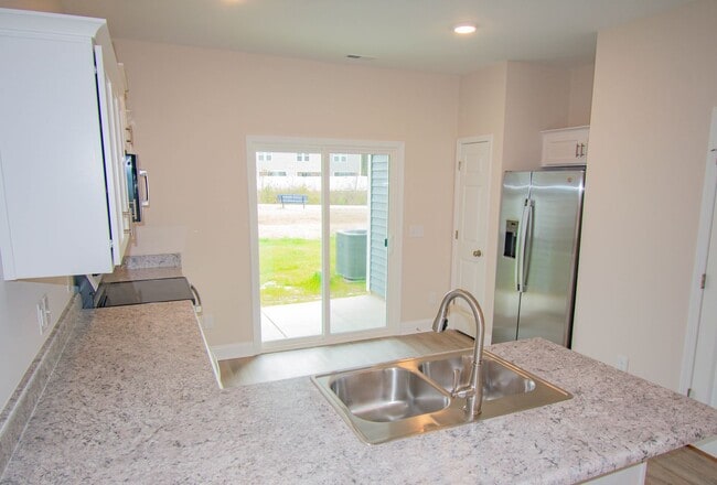 Building Photo - New Construction Townhome Available Now! 2 Bedroom 2.5 Bathroom