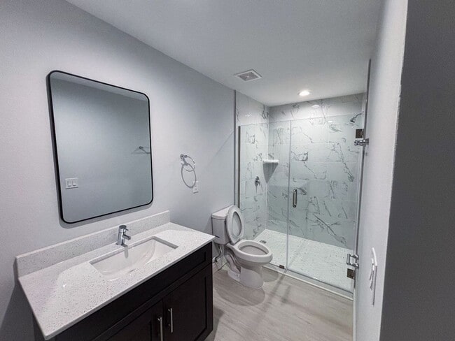 Building Photo - AMAZING OPPORTUNITY! This spacious duplex offers 3 bedrooms, 2 bathrooms, and a 1-car garage