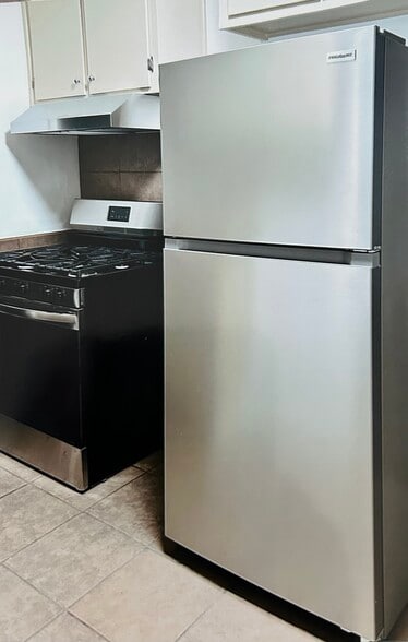 New stove & refrigerator - 4539 W 167th St