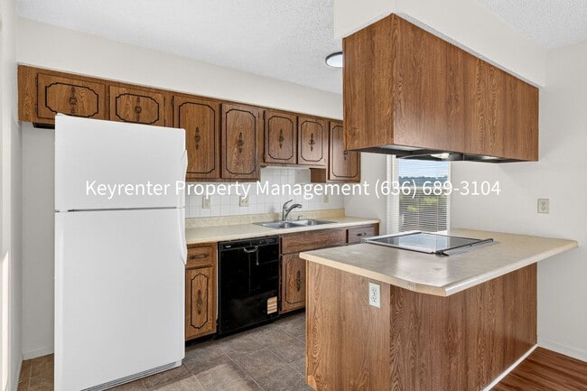 Building Photo - Charming 2-Bedroom Condo Available for Rent in Saint Peters!