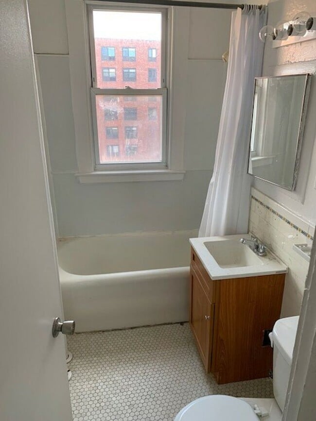 Building Photo - No Brokers fee, No Security Deposit, heat, Hot Water Included, Elevator, Laundry. Steps from the T