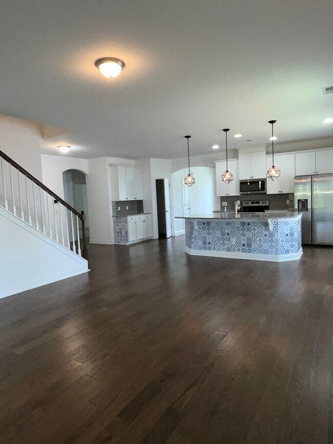 Building Photo - "Spacious 4-Bed Oasis with Stunning Lake V...