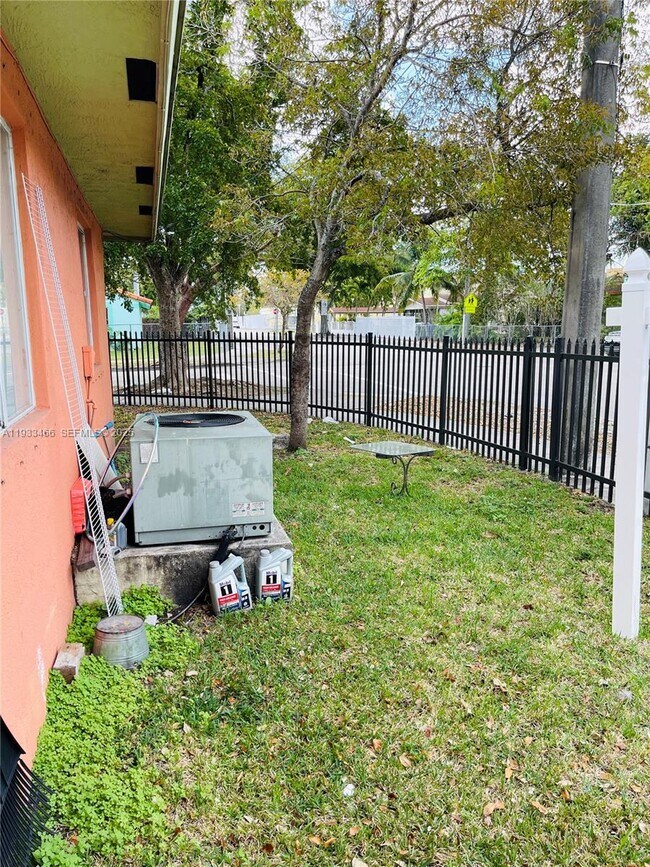 Building Photo - 5857 NW 13th Ave