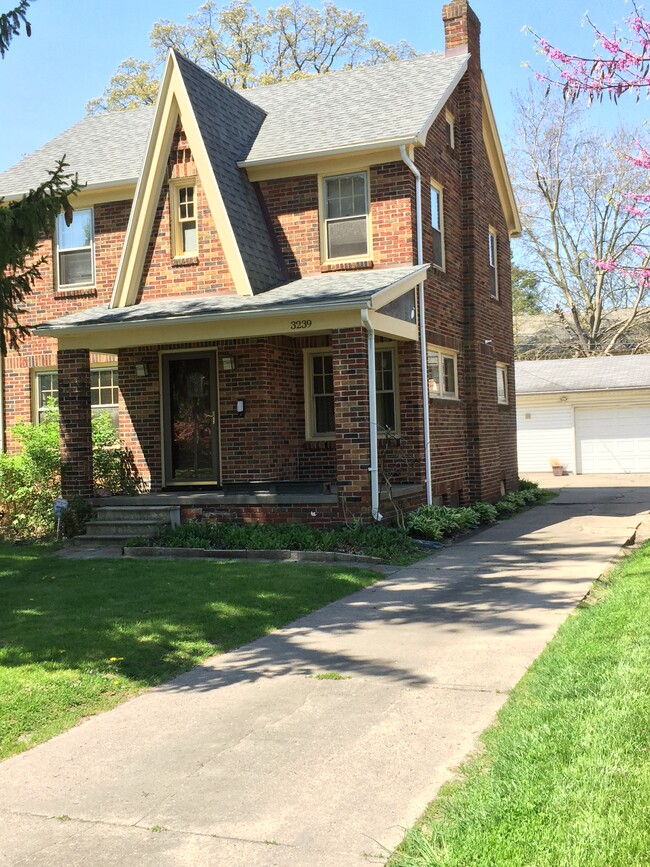 Charming front porch faces east for morning sun and evening shade. - 3239 Wendover