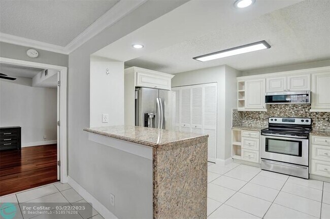 Building Photo - 12215 Royal Palm Blvd