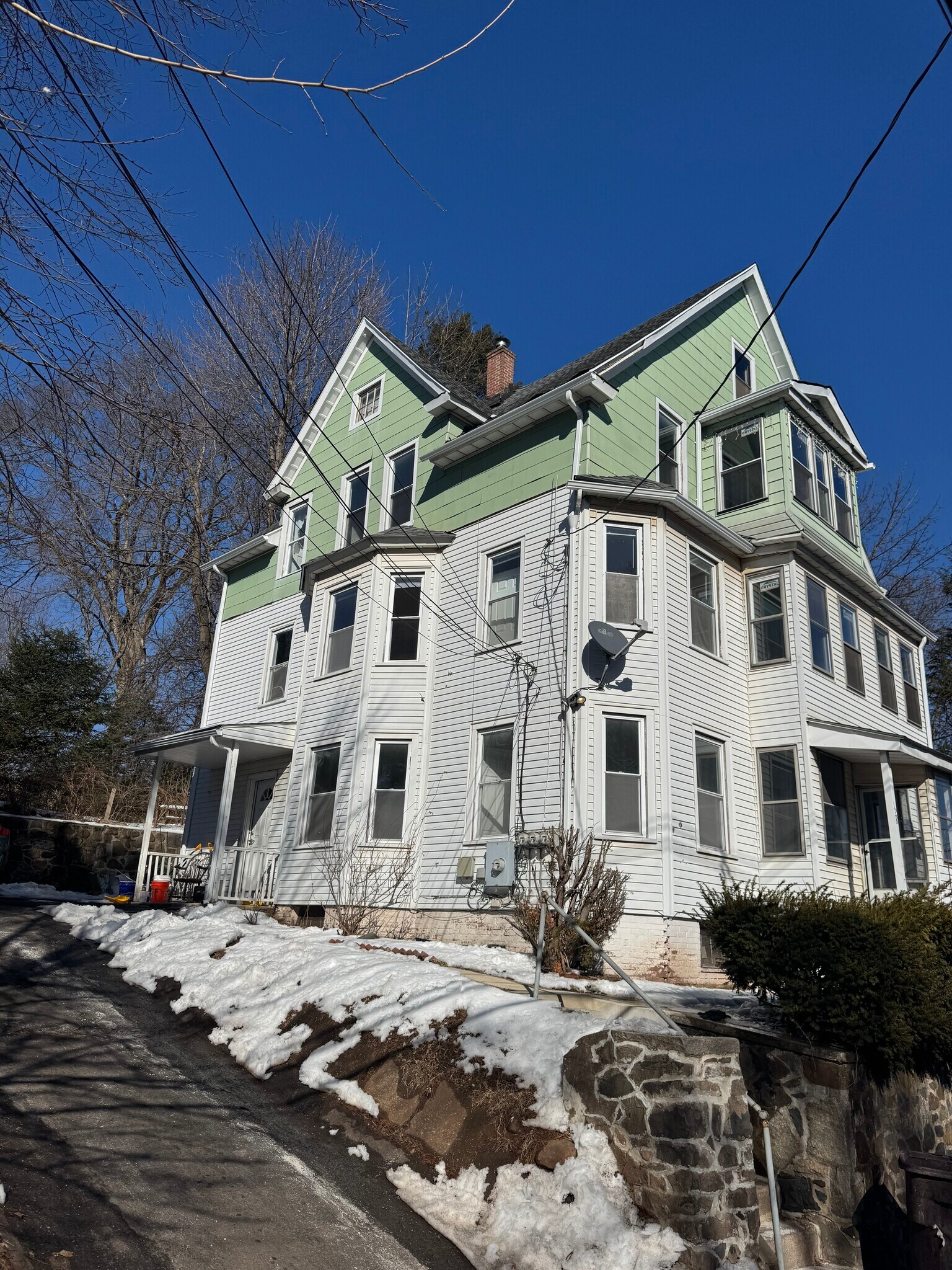 View of property from driveway - 128 Pleasant St