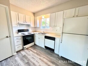 Building Photo - BEAUTIFUL AND SPACIOUS 2 BEDROOM 2 BATHROO...