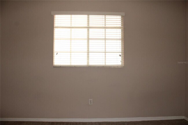 Building Photo - 5711 Bentgrass Dr