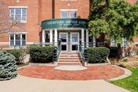 Building Photo - Updated 1BR Condo with Balcony, Garage Parking & Storage Near Commuter Rail