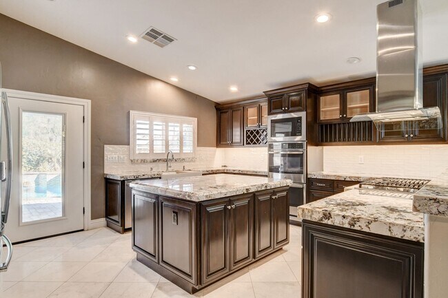 Building Photo - Stunning Aliante Single-Story with Casita ...