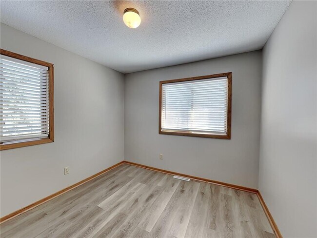 Building Photo - 11051 Quebec Ave N