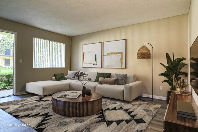 1 BR, 1 BA - Living Room - Orange Terrace Apartments