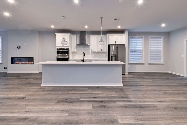 Building Photo - Three Story Brick End Unit with Rooftop Terrace