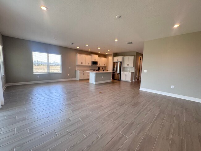 Building Photo - New Construction in Grand Park-4 Bedrooms and 4 Bathrooms with a Den and a Loft! No deposit for q...