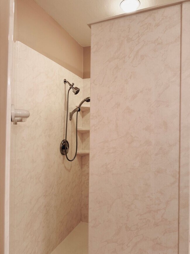 Building Photo - Experience Bell Tower Park. GATED ground floor 2 Bed 2 Bath Den 1 Car Garage Condo.