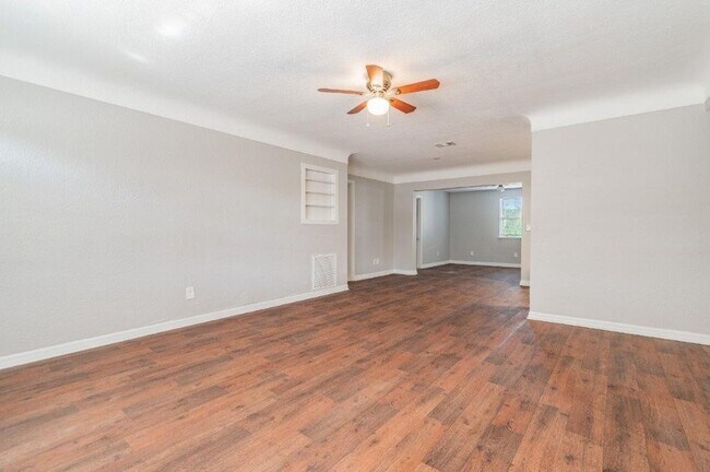 Building Photo - PRICE JUST REDUCED 3/2/1 1389 Sq. Ft. on a huge corner lot with granite & custom tile work!!