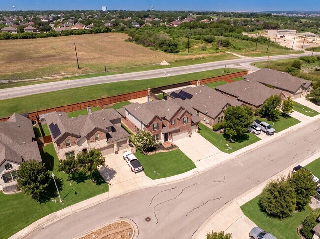 Building Photo - No Rear Neighbors, 3 Car Garage, a Chef's Kitchen, and Room for Everyone