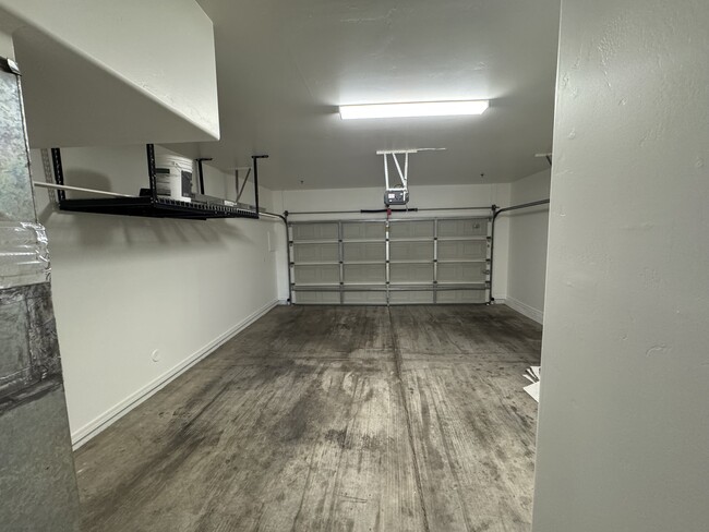 Oversized 2 car garage with storage rack - 3440 N 38th St