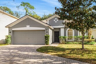 Building Photo - Cozy 4/2 Home Nestled in a Gated Community