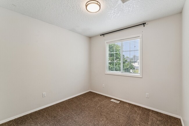 Building Photo - 5998 S Wallflower Pl