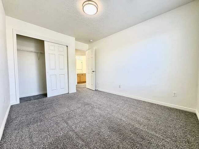 Building Photo - Spacious 3 Bed Townhome in West Valley City with Gated Yard, Garage & Pool