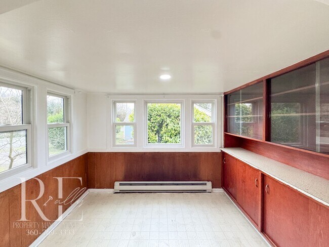 Building Photo - Charming Bremerton Rambler with Classic Warmth and Modern Comforts