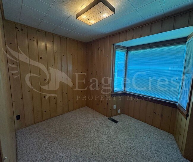Building Photo - Three Bedroom, Two Bathroom House with Fenced Yard and Outdoor Fireplace