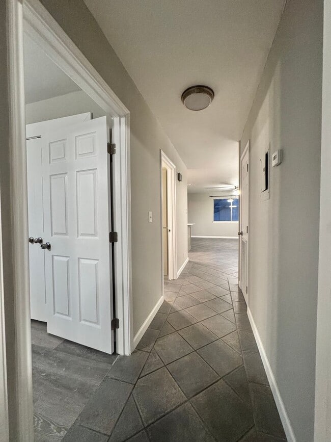 Building Photo - SECOND STORY CONDO WITH BILLS PAID