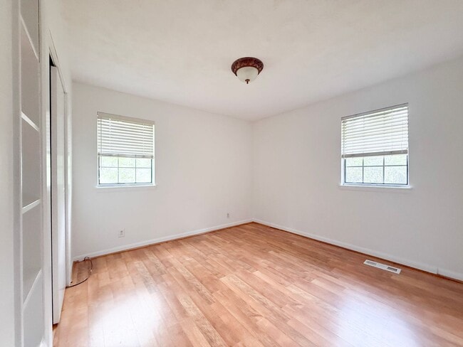 Building Photo - 2-Bedroom Home with Bonus Room & Large Wooden Deck | Pet-Friendly Near I-40 & City Lake