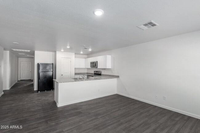 Building Photo - 9930 W Carousel Dr