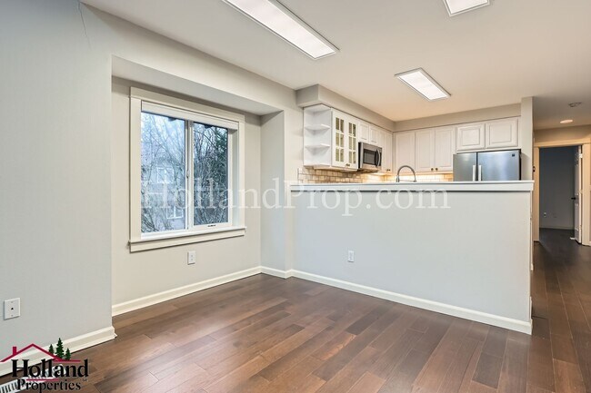 Building Photo - Spacious Home with High Ceilings and Modern Comforts!