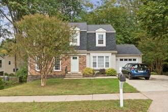 Building Photo - ocated in a sought-after community with to...