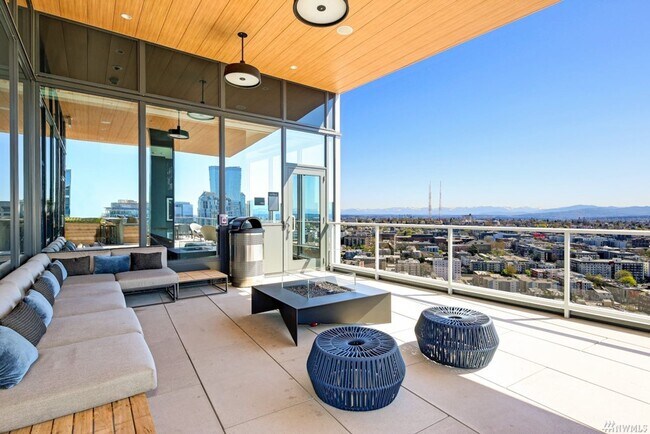 Building Photo - Spacious NW-Facing 1 Bed + Den, 1 Bath Luxury High-Rise Condo in Seattle's Denny Triangle – Nexus