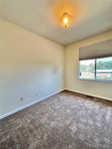 Building Photo - 10640 W 12th Ln