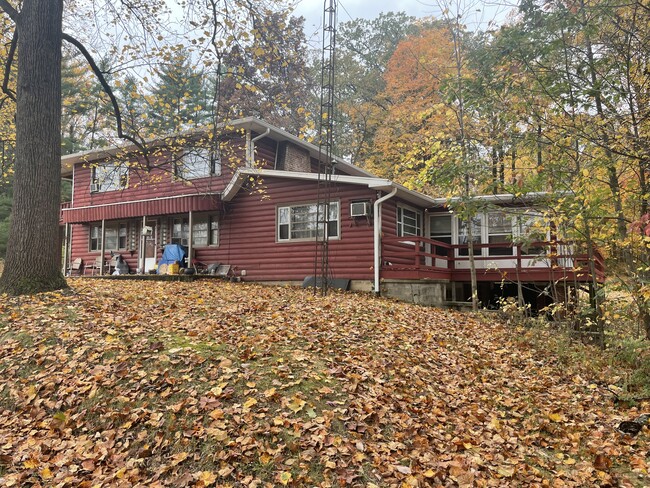 Building Photo - Log Cabin (Triplex)