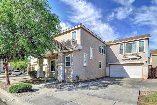 Building Photo - 1210 S 121st Dr