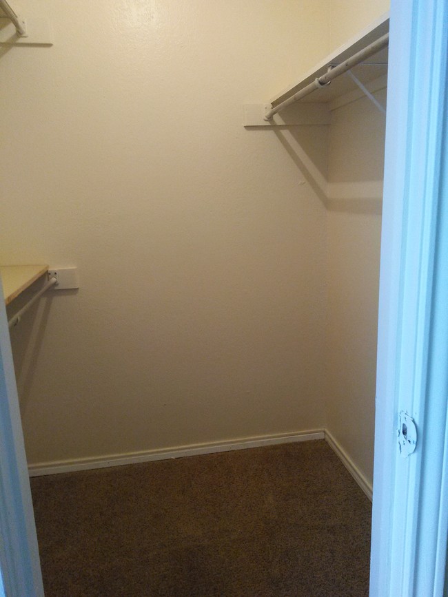 The Augusta - 1 of 2 Bedroom Closets - Preston Racquet Club Apartments