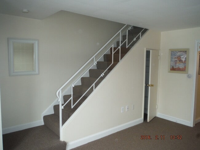 Stairs to 2nd floor - 200 Maplewood Dr