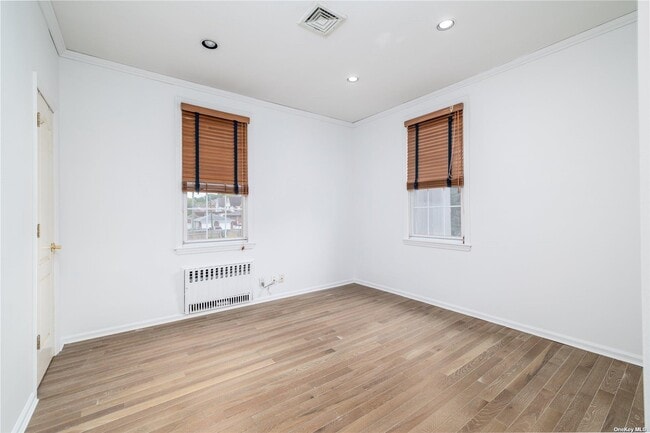 Building Photo - 26-44-44 211th St