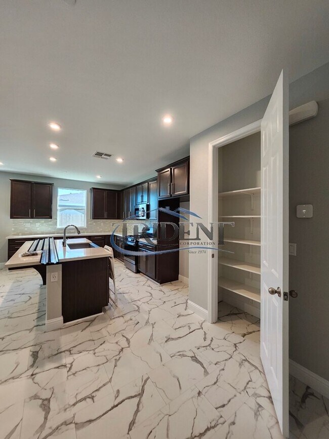 Building Photo - Updated home with a built in BBQ and play area