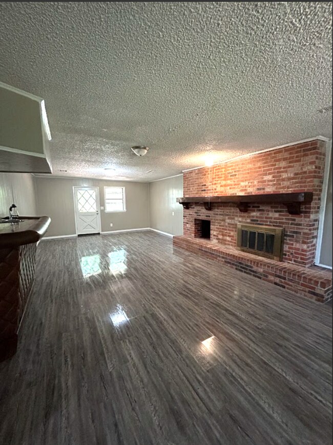 Building Photo - Spacious 5-Bedroom Home with Modern Updates and a Cozy Fireplace