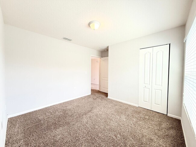 Building Photo - Spacious 4BR Home with Large Fenced Yard & Community Pool