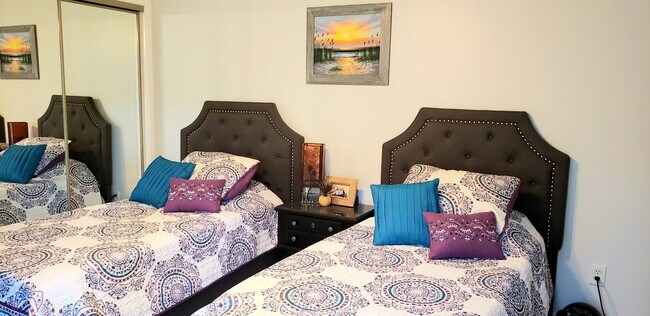 Bedroom #2 with it's own porch. - 307 Halyard Ct