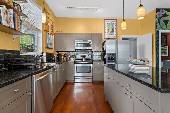Building Photo - Price Reduced! Downtown Durham 1bd/1ba Corner-Unit Condo with On-Site Personal 1-Car Garage!