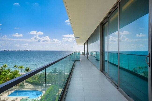 Building Photo - 10203 Collins Ave